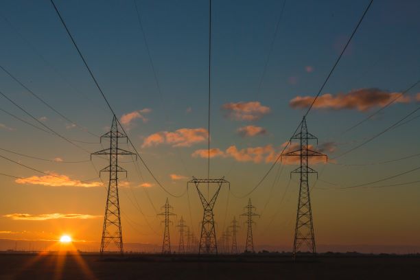 Pylons with clouds at sunset